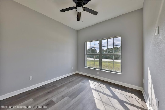 unfurnished room featuring ceiling fan and light wood-type flooring