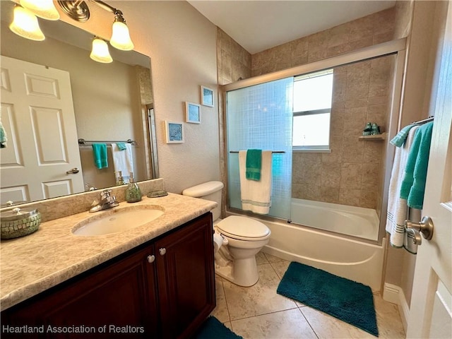 241 Sheppard Rd NW, Lake Placid, FL 33852 - full bathroom featuring vanity, toilet, shower / bath combination with glass door, and tile patterned floors
