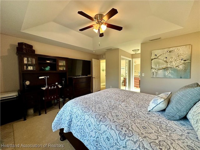 241 Sheppard Rd NW, Lake Placid, FL 33852 - bedroom with lofted ceiling, carpet, ceiling fan, visible vents, and a raised ceiling