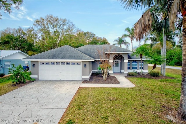 ranch-style house with a garage and a front lawn