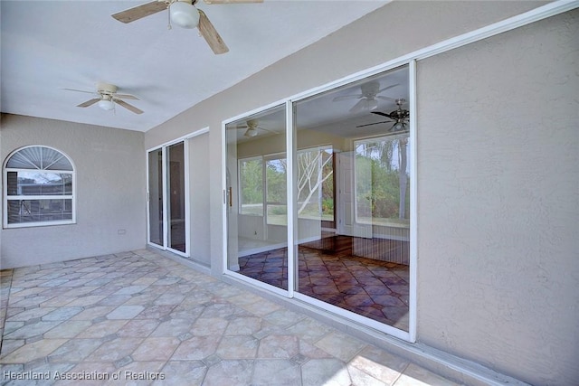 view of patio / terrace with ceiling fan