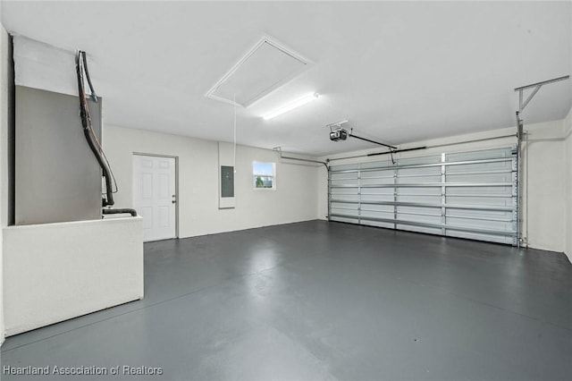 4818 Sturgeon Dr, Sebring, FL 33870 - garage with electric panel and a garage door opener
