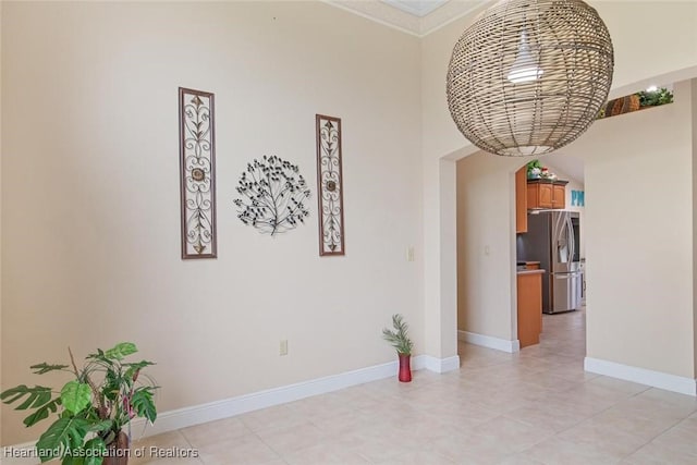 800 Spring Blvd, Sebring, FL 33876 - spare room featuring baseboards, light tile patterned flooring, and a high ceiling
