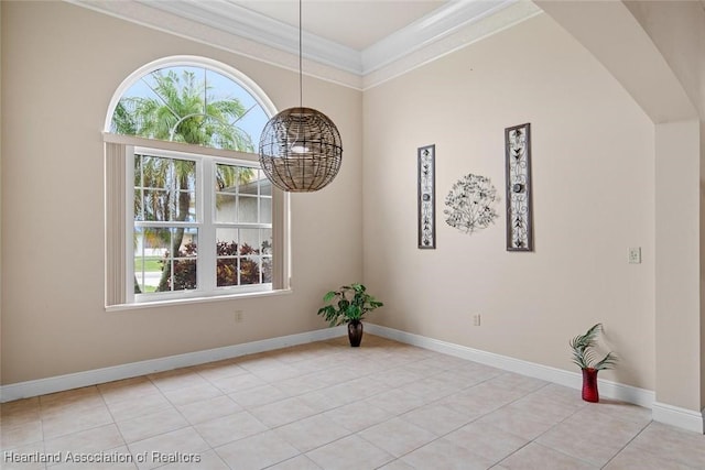800 Spring Blvd, Sebring, FL 33876 - unfurnished room featuring plenty of natural light, light tile patterned flooring, a chandelier, ornamental molding, and baseboards