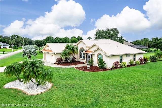 800 Spring Blvd, Sebring, FL 33876 - single story home with an attached garage, a front lawn, and stucco siding