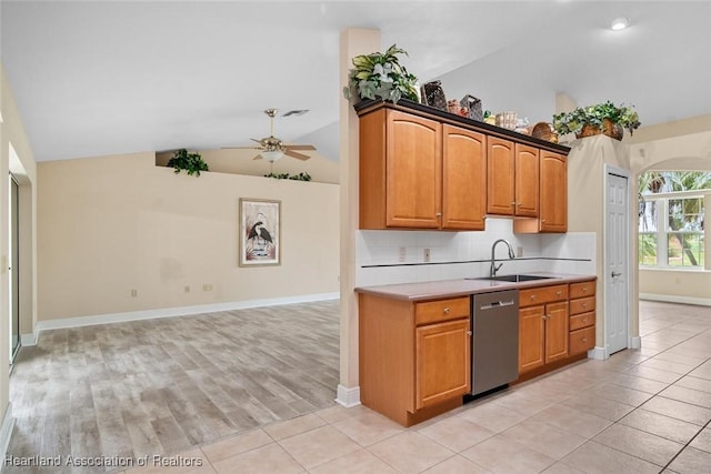 800 Spring Blvd, Sebring, FL 33876 - kitchen featuring dishwasher, a sink, light countertops, ceiling fan, and baseboards