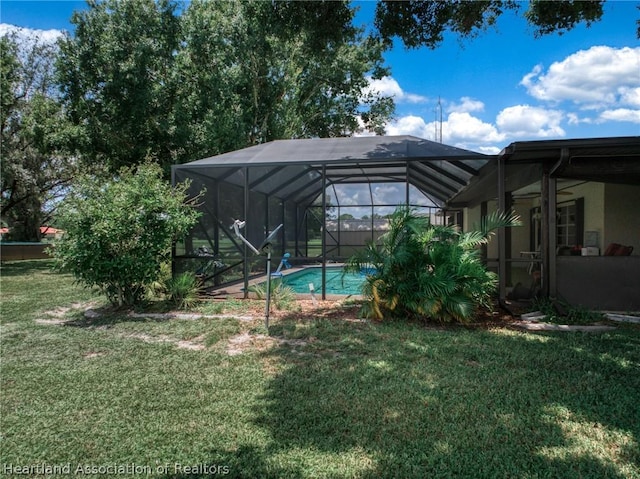 view of yard featuring a lanai