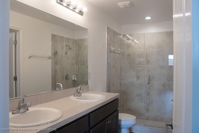525 Central Ln, Frostproof, FL 33843 - full bath featuring a shower stall, toilet, double vanity, and recessed lighting