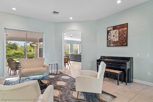 living room with light tile patterned flooring