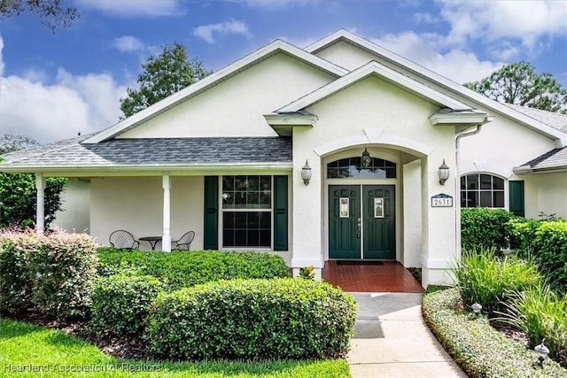 entrance to property with a porch