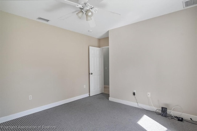 unfurnished room with ceiling fan and carpet flooring