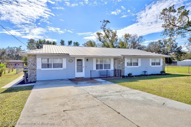 ranch-style home with a porch and a front lawn