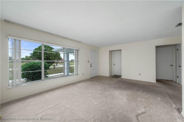 interior space featuring carpet