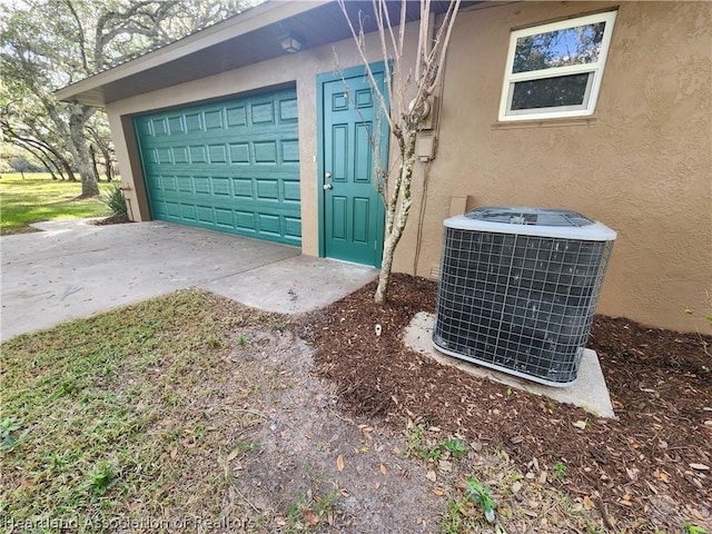 garage featuring central AC unit