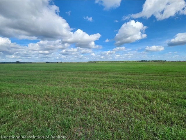 view of landscape with a rural view