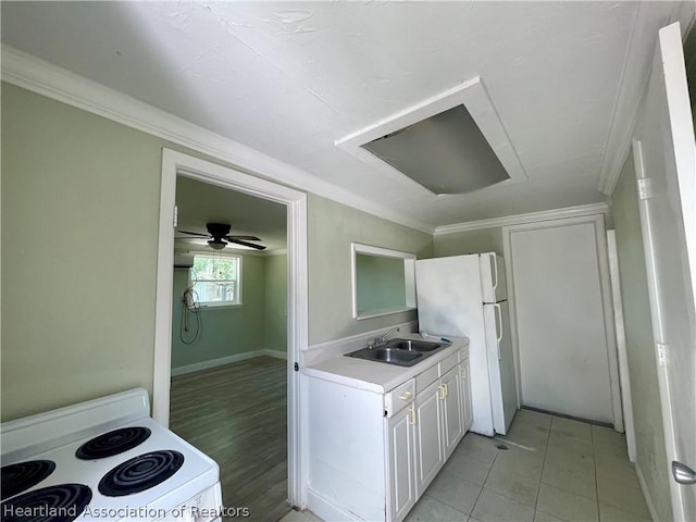 kitchen featuring ceiling fan, sink, light tile patterned floors, white appliances, and white cabinets