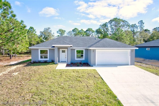 single story home featuring a front yard and a garage