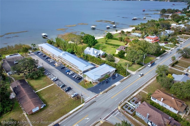 bird's eye view with a water view