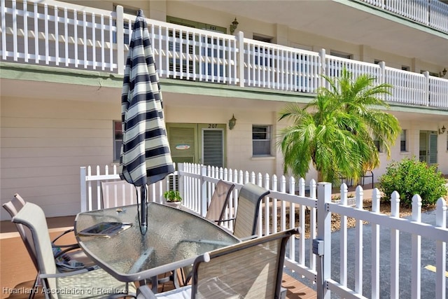 view of patio / terrace with a balcony