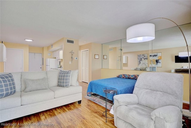 living room with hardwood / wood-style flooring