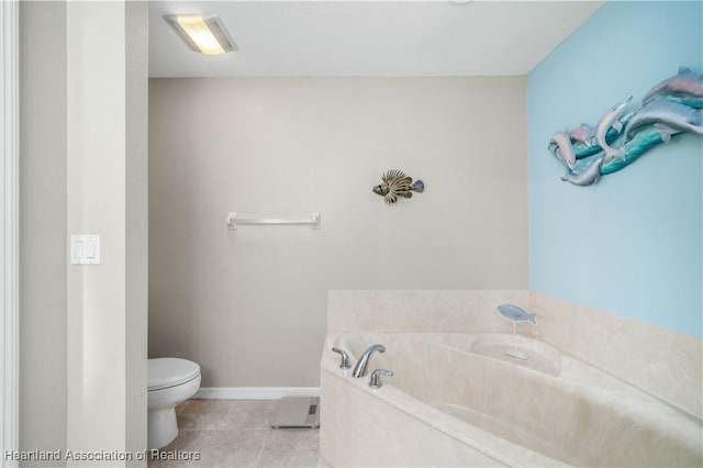 bathroom featuring toilet, a bath, and tile patterned flooring