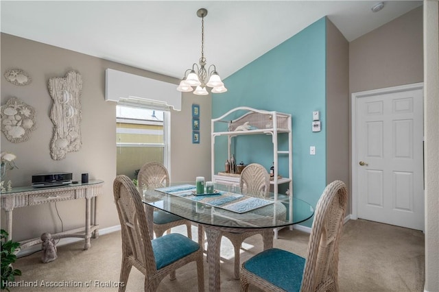 dining area with light carpet, an inviting chandelier, and lofted ceiling