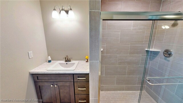 129 Badger Loop, Ona, FL 33865 - bathroom featuring a shower stall and vanity