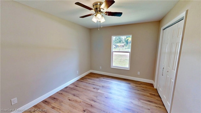 129 Badger Loop, Ona, FL 33865 - unfurnished bedroom with light wood-style flooring, a closet, and a ceiling fan