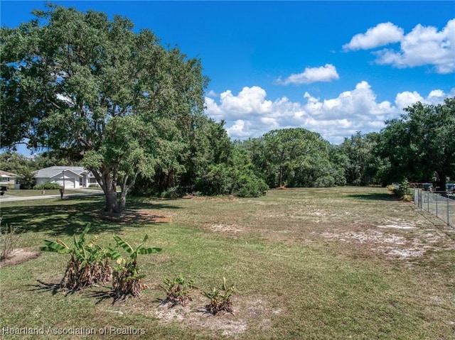 view of yard featuring fence