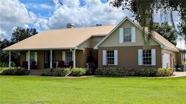 1779 State Road 62nd Rd, Bowling Green, FL 33834 - view of front of home featuring a front yard, a porch, an attached garage, a chimney, and stucco siding
