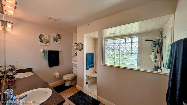 1779 State Road 62nd Rd, Bowling Green, FL 33834 - bathroom featuring a walk in shower, visible vents, toilet, a sink, and tile patterned floors