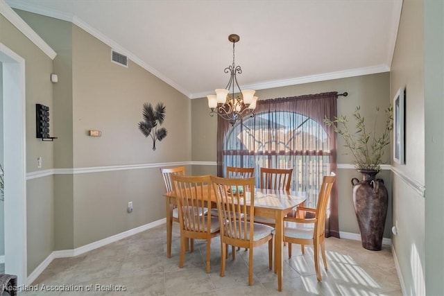 dining space with an inviting chandelier and ornamental molding