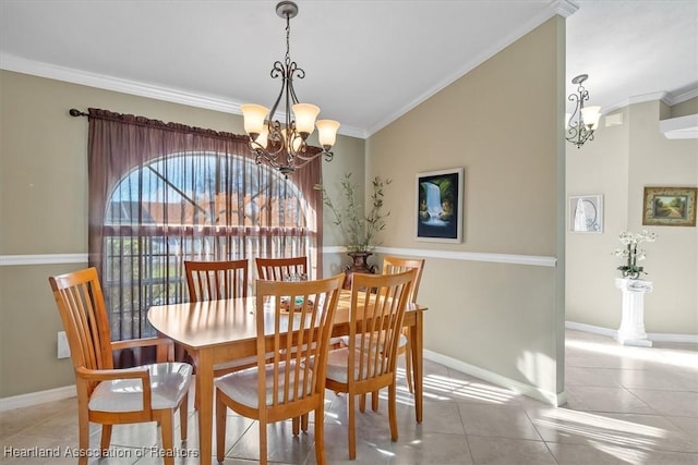 dining area featuring crown molding, lofted ceiling, light tile patterned floors, and a chandelier