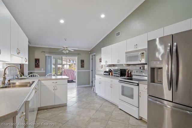 kitchen with sink, white cabinetry, ornamental molding, white appliances, and backsplash