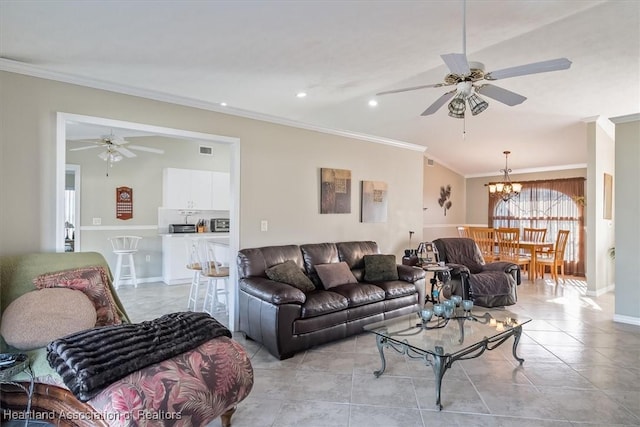 living room with crown molding, ceiling fan with notable chandelier, and light tile patterned floors