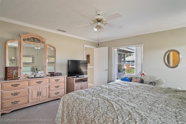 bedroom featuring crown molding, ceiling fan, and carpet floors