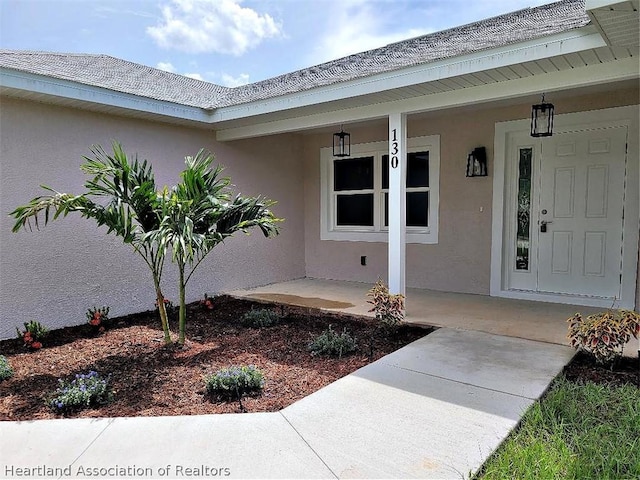 property entrance with a porch