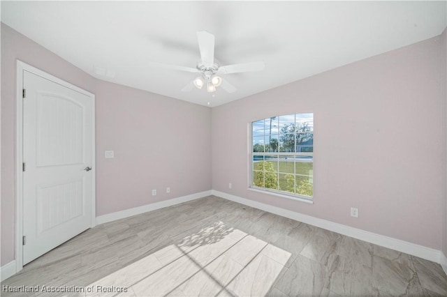 empty room with ceiling fan