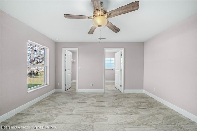 empty room featuring ceiling fan