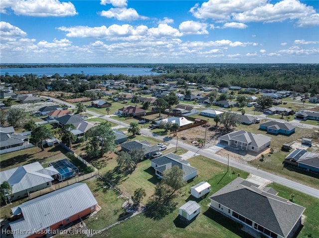 drone / aerial view featuring a water view