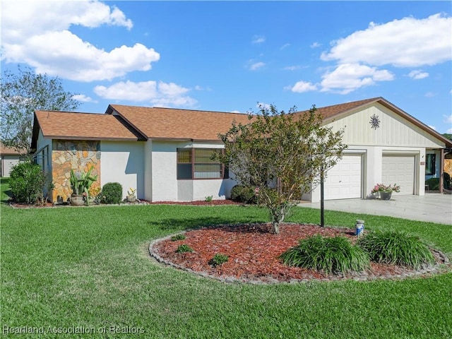 ranch-style home featuring a front yard and a garage