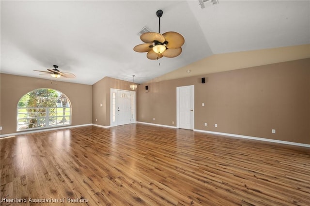 unfurnished living room with wood finished floors, visible vents, and ceiling fan