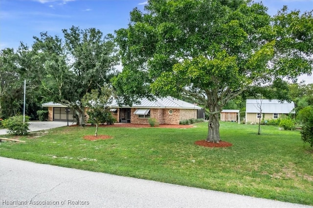 single story home featuring a front yard and a carport