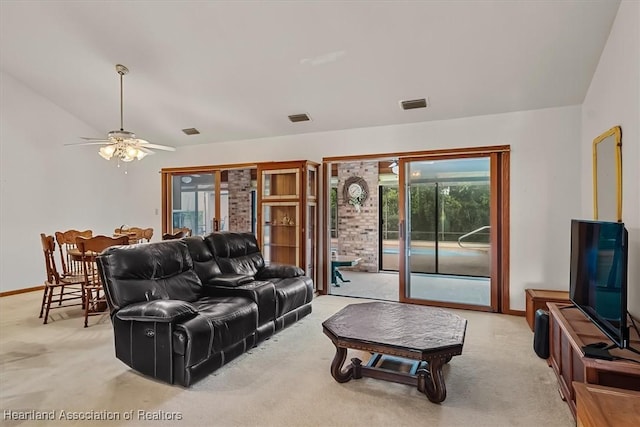 living room with light carpet and ceiling fan