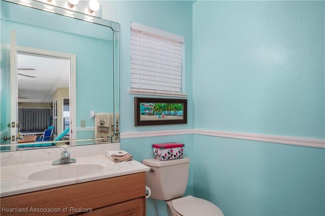 560 Lake June Rd, Lake Placid, FL 33852 - bathroom with toilet and vanity
