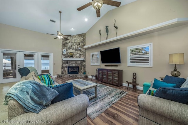 560 Lake June Rd, Lake Placid, FL 33852 - living room with high vaulted ceiling, ceiling fan, visible vents, and wood finished floors