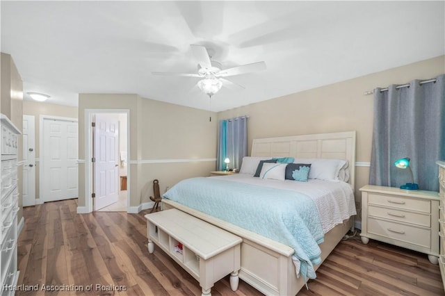 560 Lake June Rd, Lake Placid, FL 33852 - bedroom with baseboards, wood finished floors, and a ceiling fan