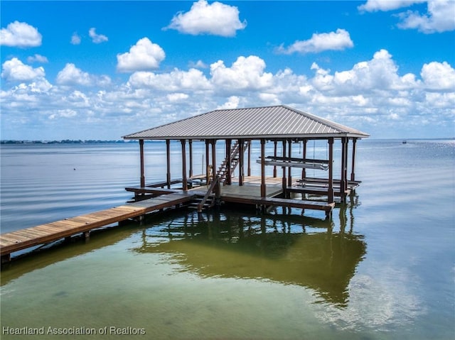 dock area featuring a water view and boat lift