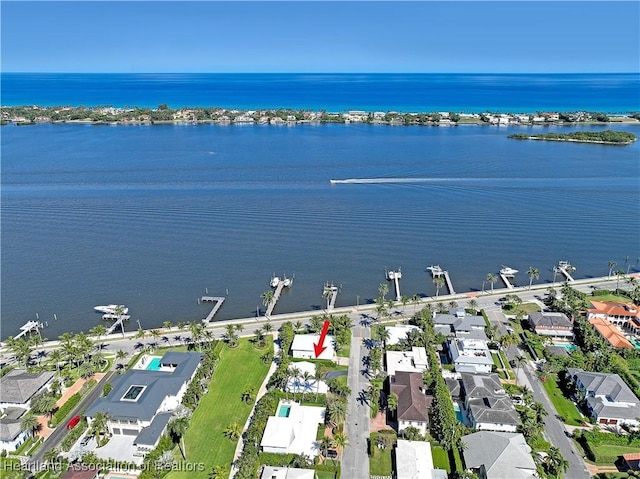115 Elwa Pl, West Palm Beach, FL 33405 - aerial perspective of suburban area featuring a nearby body of water