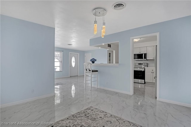 115 Elwa Pl, West Palm Beach, FL 33405 - unfurnished living room with light marble finish flooring